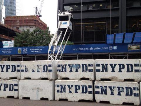 Zuccotti surrounded by cement barricades
