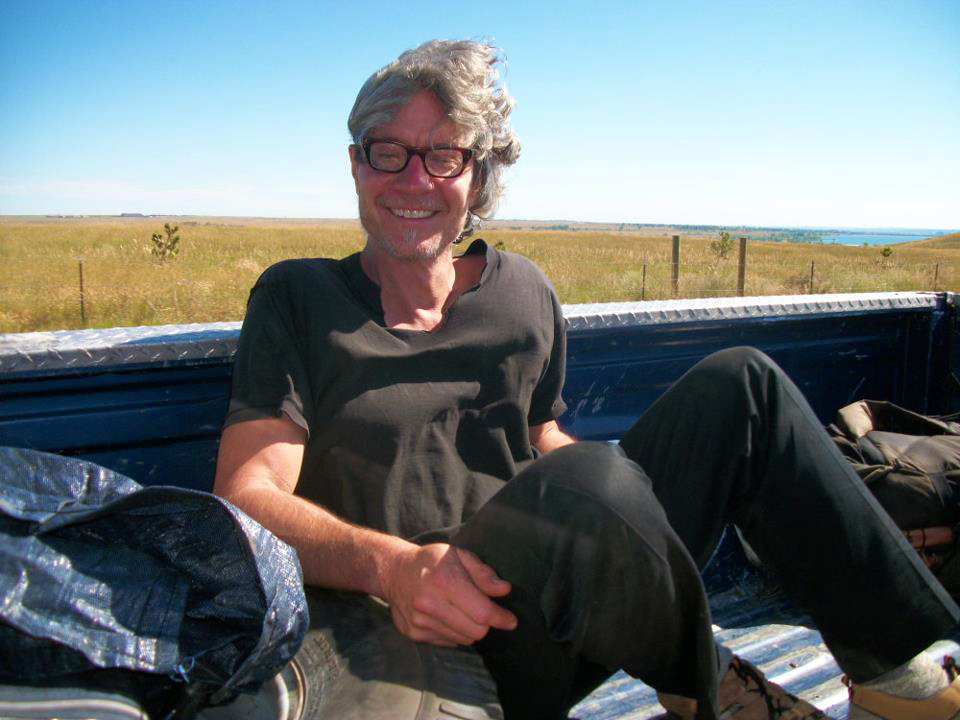 Daniel Suelo catches a ride in Arvada, Colorado.