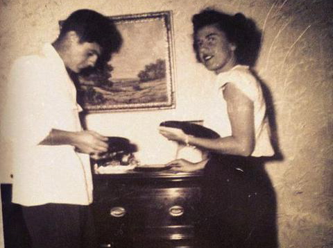 Grandma Norma Grande and her brother, Billy. We don't know what records they are playing.
