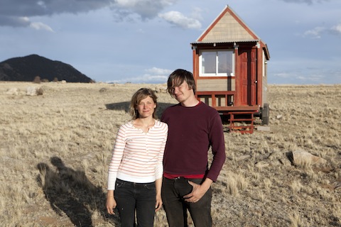 Two tiny housers modeling how to live in a tiny house