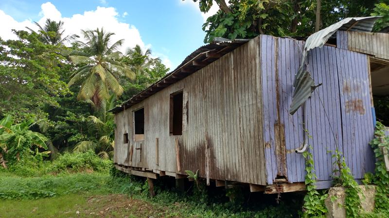 A house purchased by ENLACE that will be demolished to allow canal restoration.