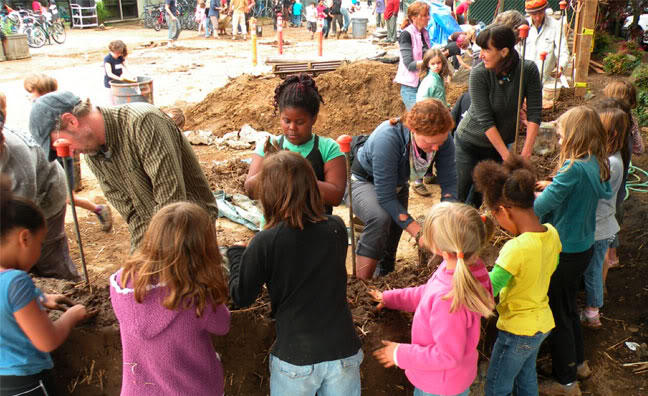 Village Building Convergence, photo credit cityrepair.org