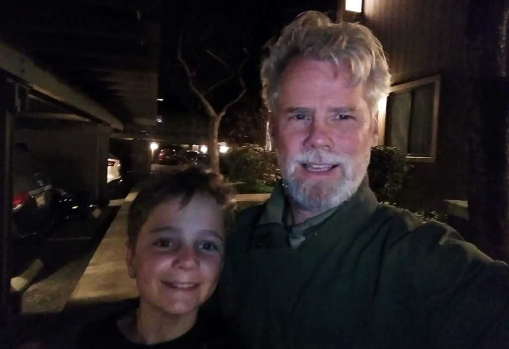 Knocking doors for Cool Block with my son Jake