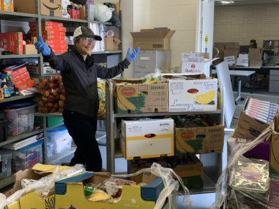 Toronto Public Library (TPL) staff members prepare for a food distribution day at the library's Ellesmere Distribution Centre. Photos courtesy of Michelle Leung, TPL.