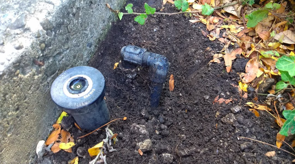 Squirrels chew up our irrigation system. I had to replace this leaky swing arm, one of hundreds of repairs and adjustments over the last few months. Photo by Neal Gorenflo. 