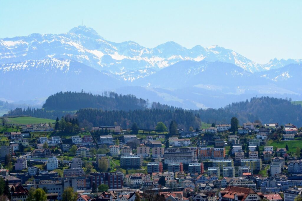 a city with mountains in background
