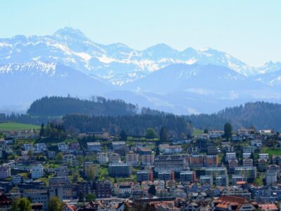 a city with mountains in background
