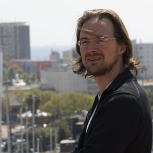 photo of Operations Member Wouter Tebbens outside in front of city skyline
