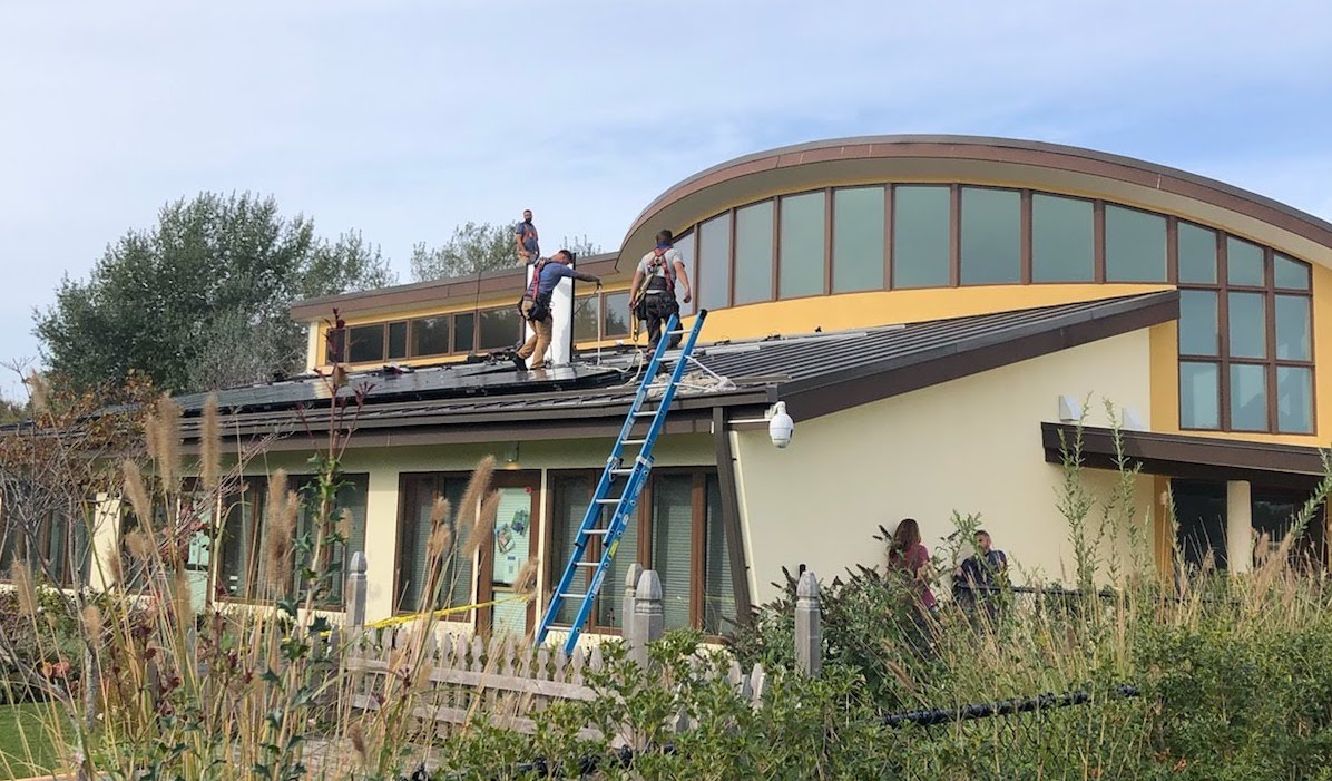 energy, The solar panel array along the Wuneechanunk Shinnecock Preschool was designed and installed, in part, to enhance the aesthetic of the school. Credit: Denise Williams