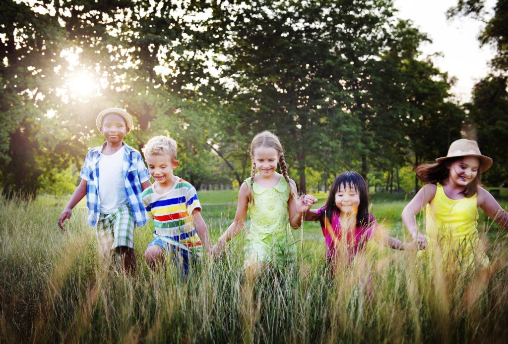 Happy children running free outdoors; Image by rawpixel.com.